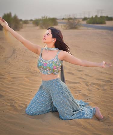 Actress  Nivedita Chandel Showcases Beauty, Grace, And Desert Vibes In A Stunning Dubai Photoshoot